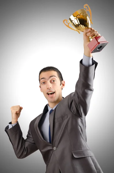 Man being awarded with golden cup — Stock Photo, Image