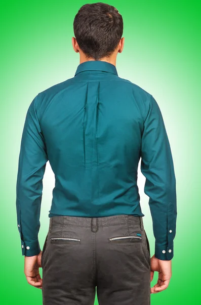 Male model wearing shirt against the gradient — Stock Photo, Image