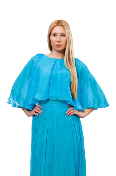 Ung kvinna i mild blå klänning isolerad på vit — Stockfoto