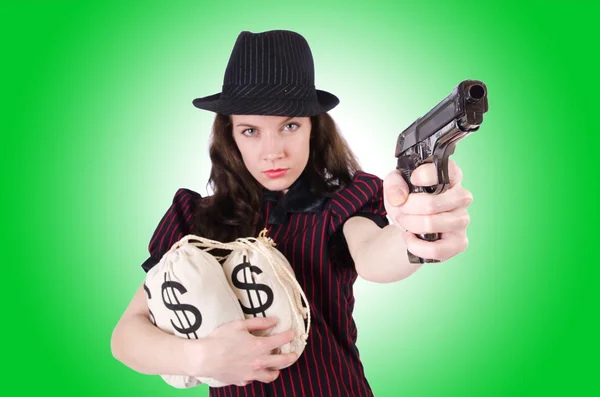 Mujer gangster con arma y dinero —  Fotos de Stock