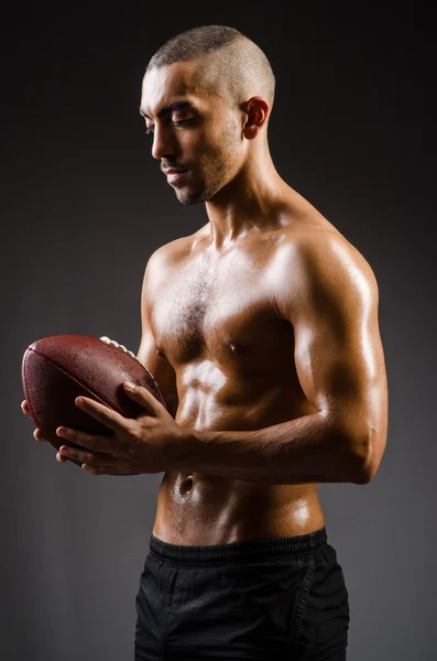 Muscular football player — Stock Photo, Image