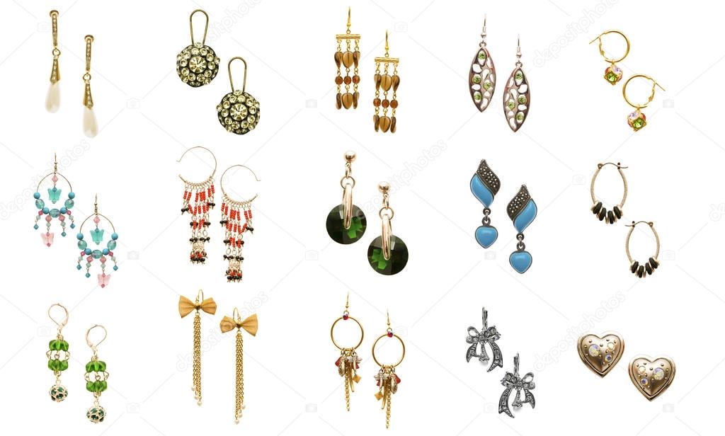 Set of various earrings isolated on white