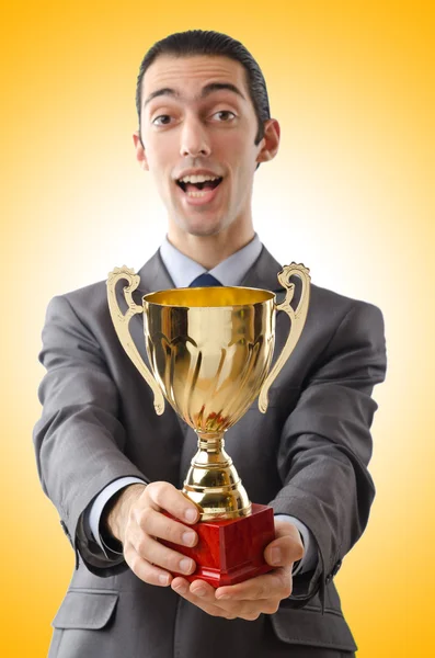 Man being awarded with golden cup — Stock Photo, Image