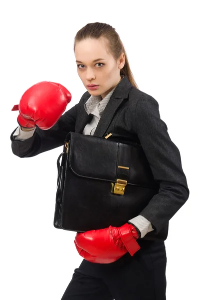 Mujer de negocios con guantes de boxeo aislados en blanco — Foto de Stock