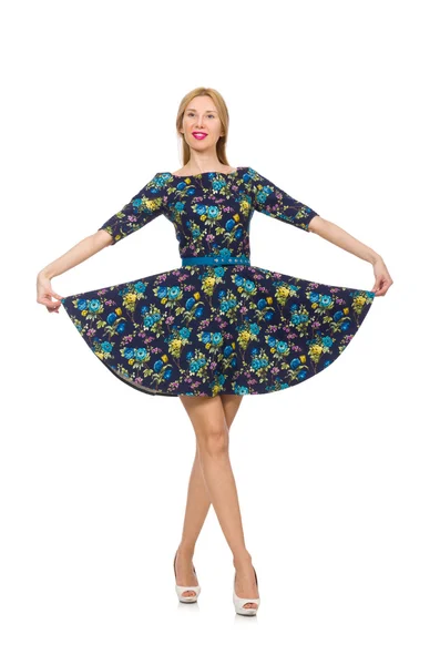 Frau in dunkelblauem Blumenkleid — Stockfoto