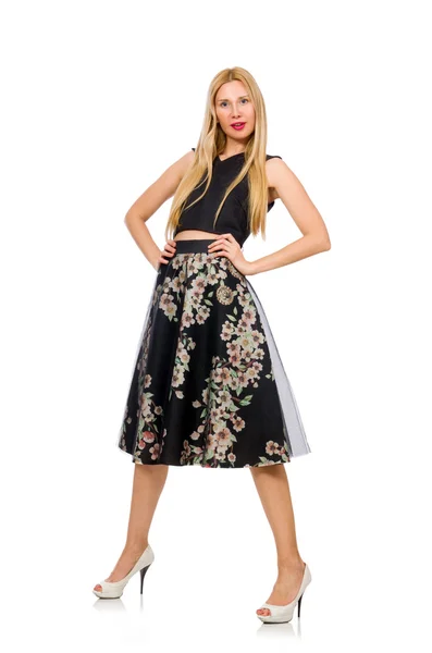 Vrouw in floral donkere rok — Stockfoto