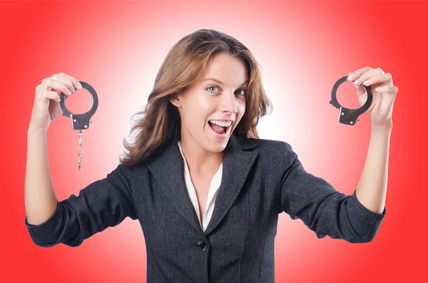 Female businesswoman with handcuffs — Stock Photo, Image
