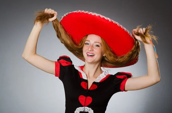 Woman in red sombrero hat — Stock Photo, Image