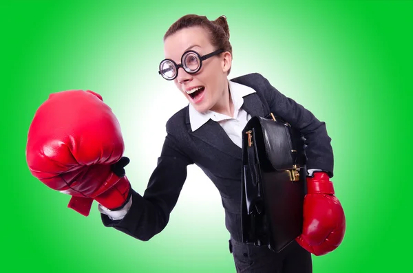 Businesswoman with boxer gloves — Stock Photo, Image