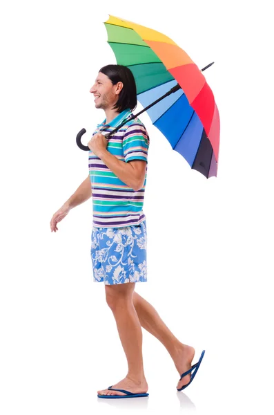 Человек с красочным зонтиком — стоковое фото
