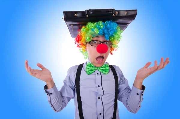 Clown businessman on blue — Stock Photo, Image
