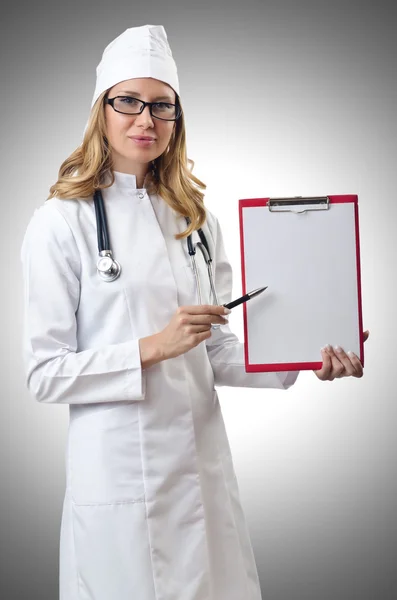 Woman doctor isolated on gray Stock Image