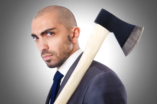 Funny businessman with axe against the gradient — Stock Photo, Image
