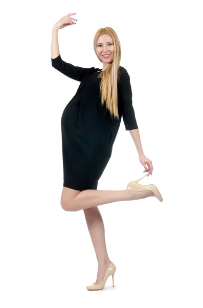 Beyaz izole mini siyah elbiseli güzel hamile kadın — Stok fotoğraf