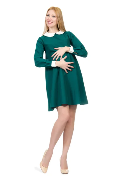 Bella donna incinta in abito verde isolato su bianco — Foto Stock