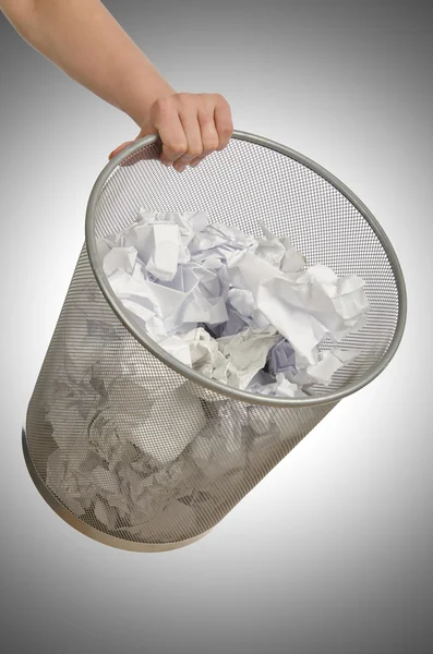 Hands with garbage bin with paper — Stock Photo, Image