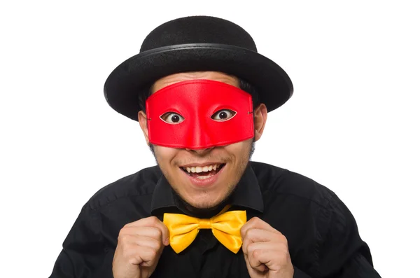 Mladý muž v černém kostýmu a červené masce izolované na bílém — Stock fotografie