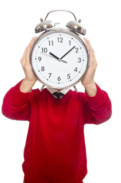 Estudiante con reloj despertador aislado en blanco — Foto de Stock