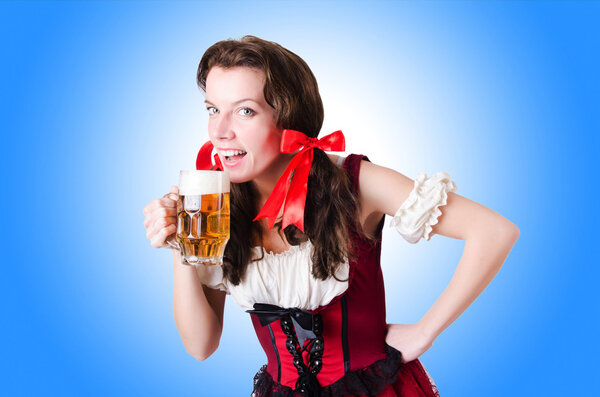 Bavarian girl with tray on white