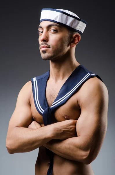 Ripped sailor against dark background — Stock Photo, Image