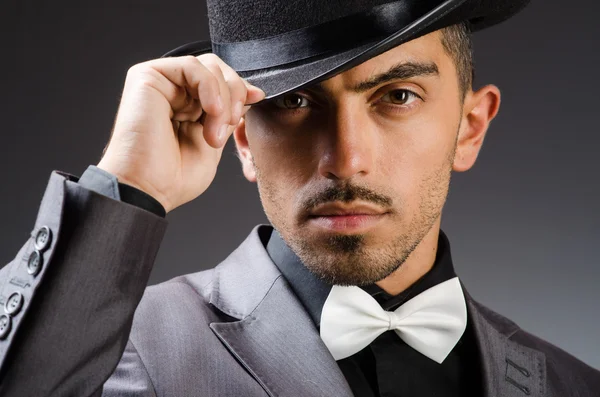 Man with hat in vintage concept — Stock Photo, Image