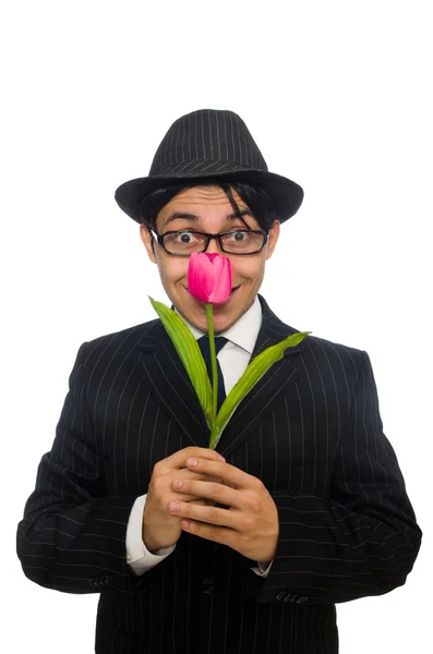 Jeune homme en costume noir avec fleur isolée sur blanc — Photo