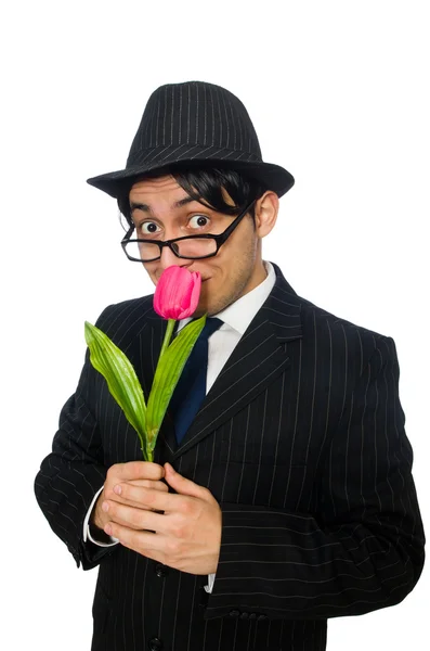 Young man in black costume with flower isolated on white — Stock Photo, Image