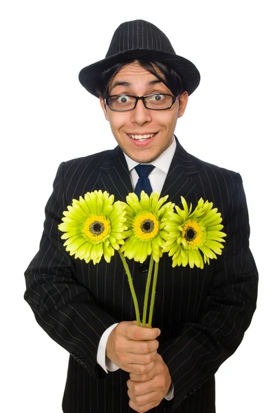 Hombre joven en traje negro con flor aislada en blanco — Foto de Stock