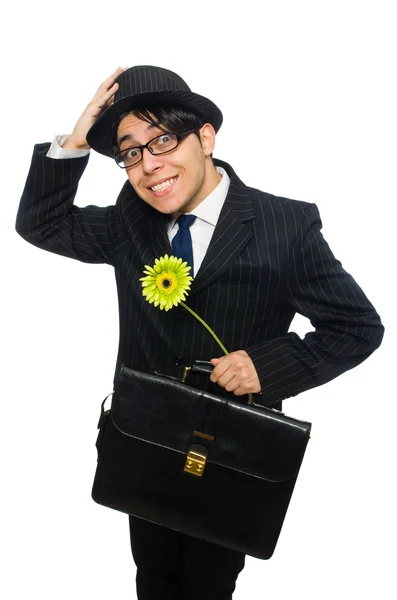 Jovem de traje preto com flor isolada em branco — Fotografia de Stock