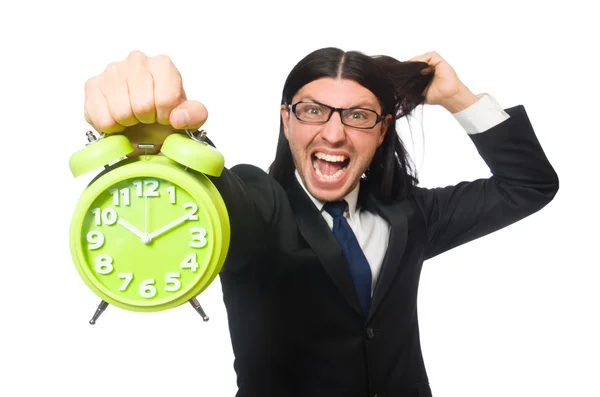 Hombre de negocios guapo sosteniendo reloj despertador aislado en blanco — Foto de Stock