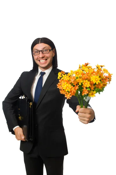 Handsome businessman with flower and brief case isolated on white — Stock Photo, Image