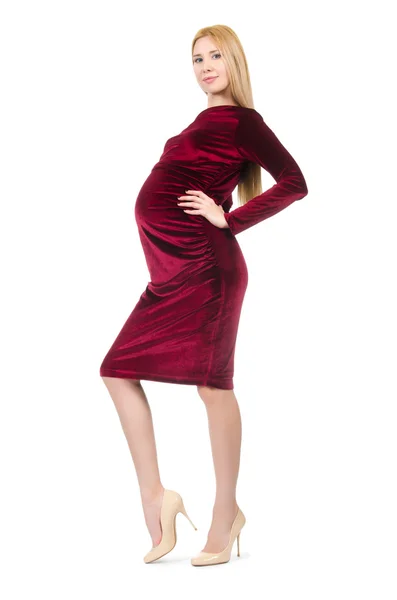 Velmi těhotná žena v červených šatech izolovaných na bílém — Stock fotografie