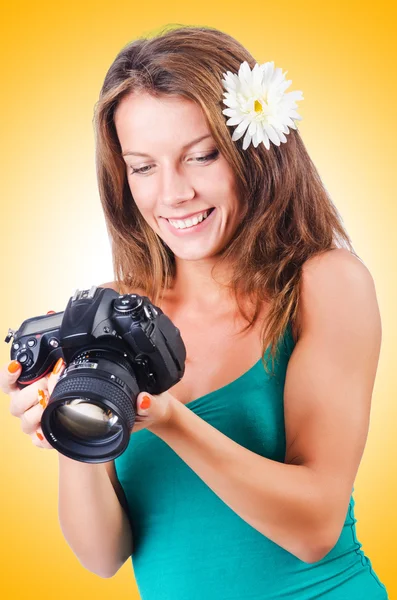 Attractive female photographer — Stock Photo, Image