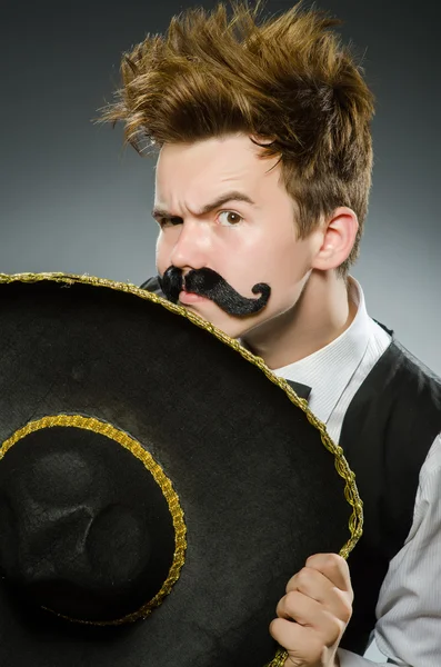 Smiling mexican with sombrero isolated on grey — Stock Photo, Image