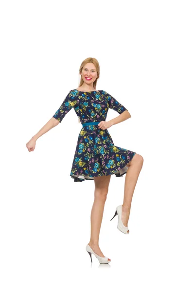 Frau in dunkelblauem Blumenkleid — Stockfoto