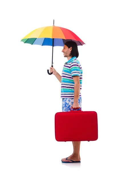 Traveler with red case  and umbrella isolated on white — Stock Photo, Image