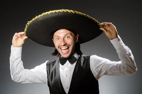 Mexican man wears sombrero isolated on grey — Stock Photo, Image