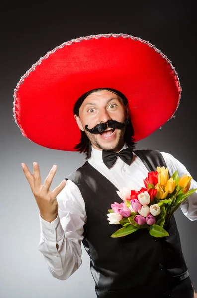 Mexican man wears sombrero isolated on grey — Stock Photo, Image