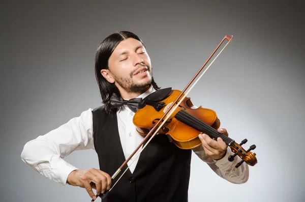 Musiker spielt Cello isoliert auf grau — Stockfoto