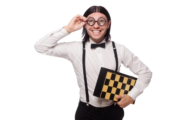Engraçado jovem com tabuleiro de xadrez isolado em branco — Fotografia de Stock
