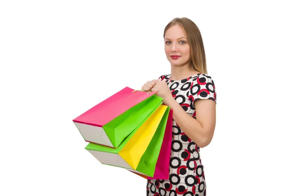 Jonge vrouw na het winkelen geïsoleerd op de witte — Stockfoto