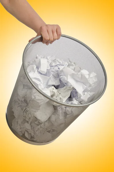 Hands with garbage bin with paper — Stock Photo, Image