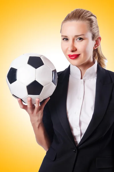 Businesswoman with ball against the gradient — Stock Photo, Image