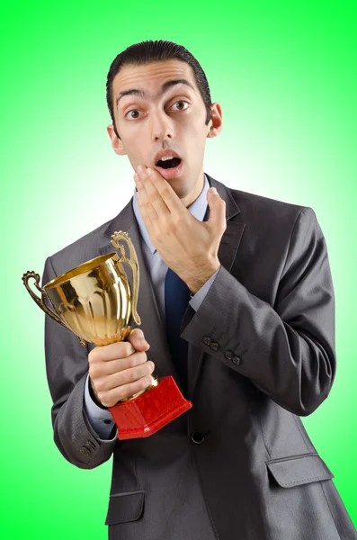 Homem sendo premiado com copo de ouro — Fotografia de Stock