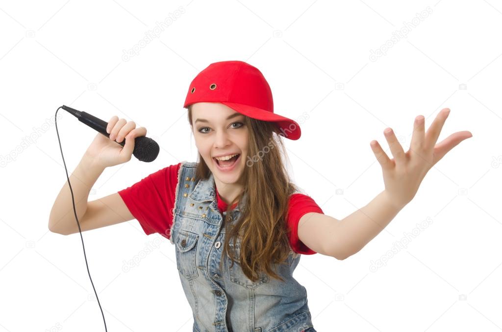 Pretty girl sings karaoke isolated on white