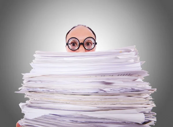 Funny man with lots of papers against the gradient — Stock Photo, Image