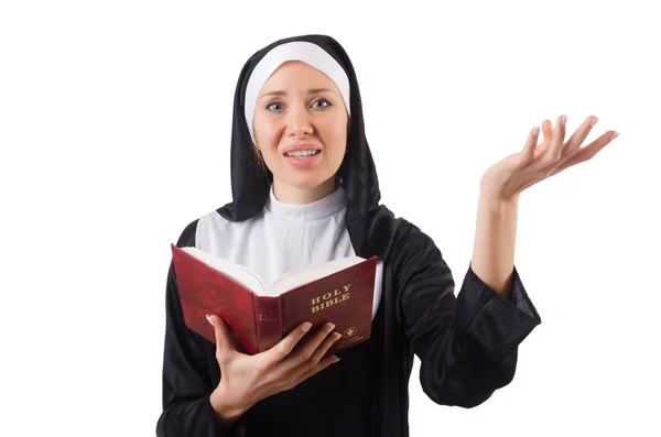 Pretty nun with Bible isolated on white — Stock Photo, Image