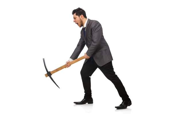 Young businessman holding a tool isolated on white — Stock Photo, Image