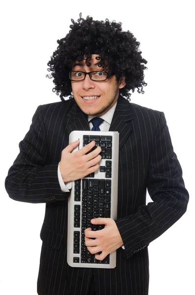 Junger Mitarbeiter mit Tastatur — Stockfoto