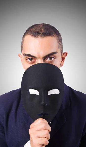 Homem com máscara contra o gradiente — Fotografia de Stock